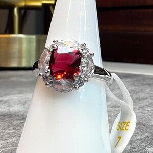 Ring Bomb Party Ring, NWOT, size 7, Red gemstone silver color band